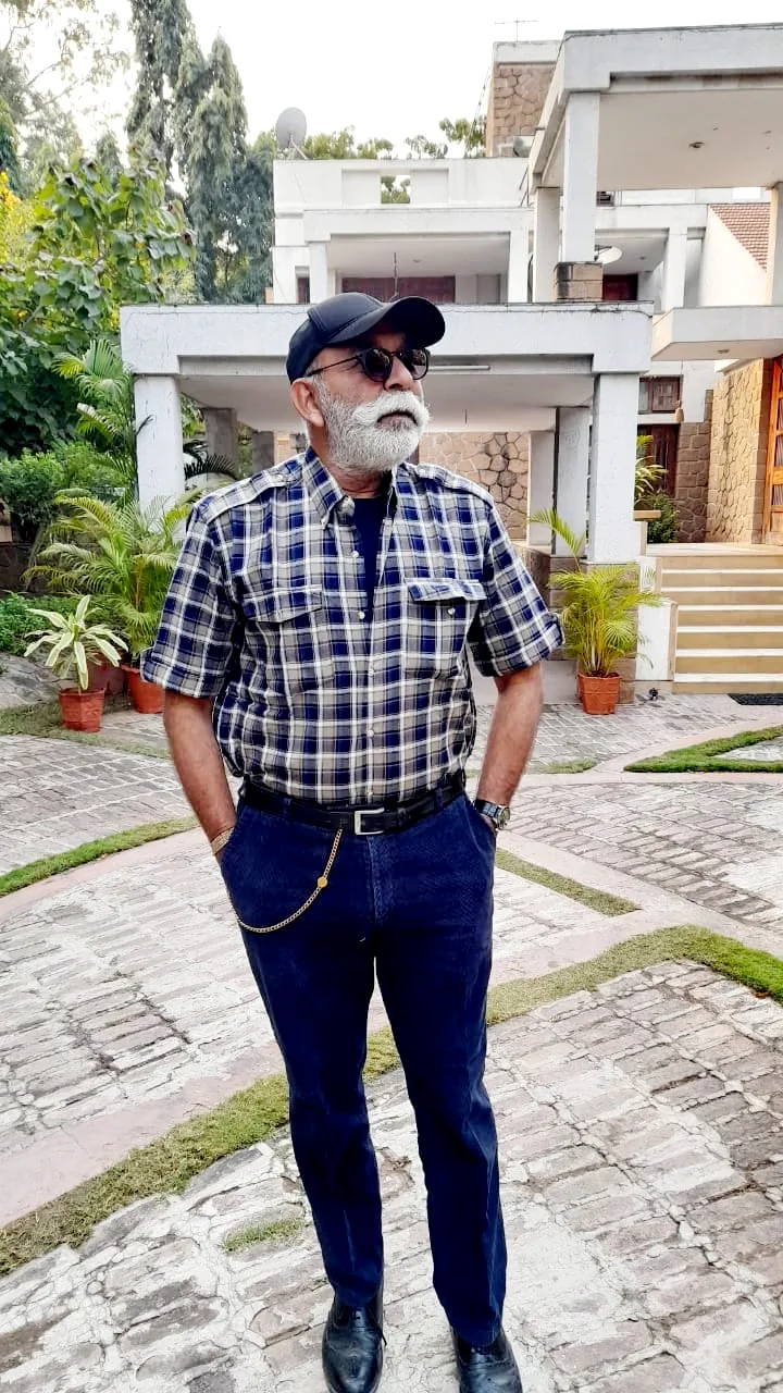 Mehul Vadodaria in a checked shirt outdoors